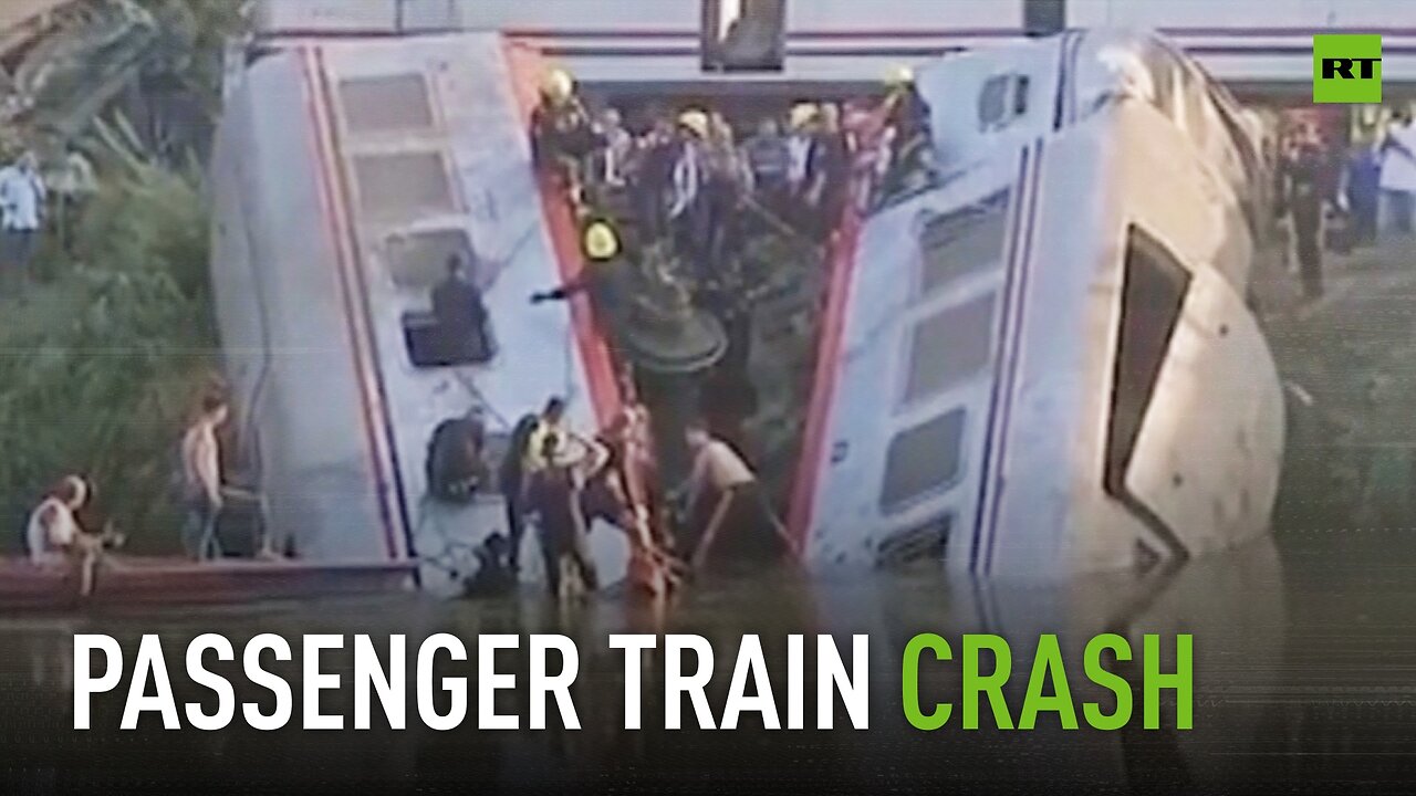 Passenger train crush in Egypt sends carriages plunging into watercourse