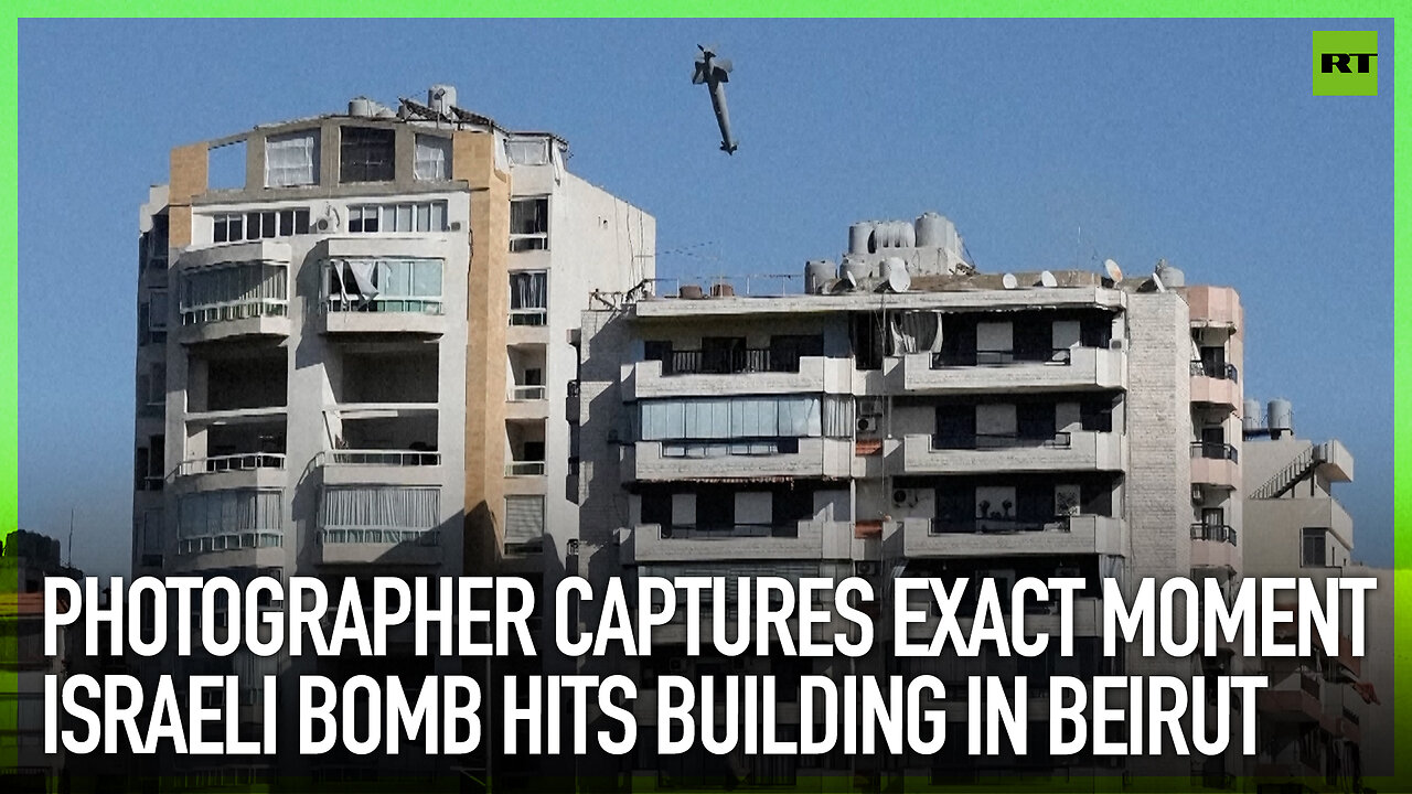 Photographer captures exact moment Israeli bomb hits building in Beirut