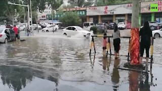 Severe floods leave 33 dead and over 250,000 evacuated in Central China