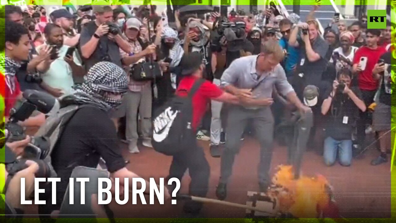 Man attempts to extinguish burning American flag during anti-Israel protest in Washington