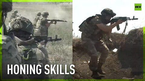 Russian riflemen practice tactics for capturing enemy strongholds and trenches