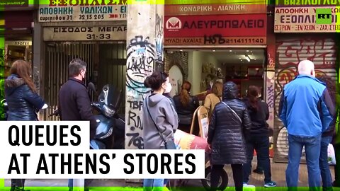 Athens residents line up at supermarkets for groceries