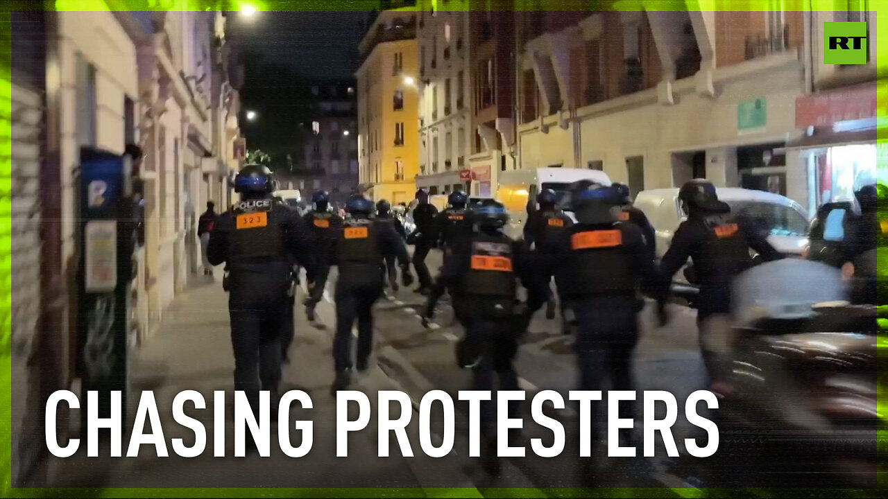 Police chase protesters after rally against right-wing political forces in Paris