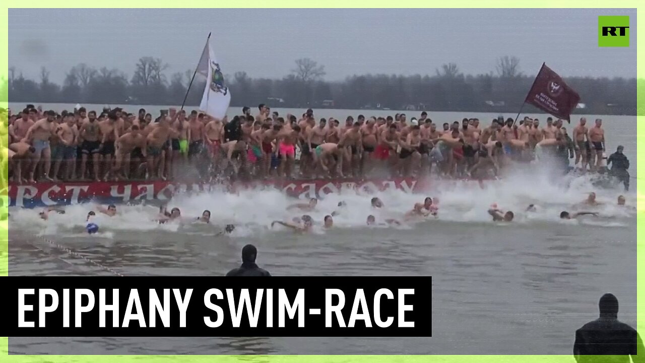 Orthodox Christians celebrate Epiphany with traditional swim-race in Danube