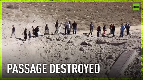 Israeli airstrikes create massive craters, blocking Lebanese highway at key Syrian crossing