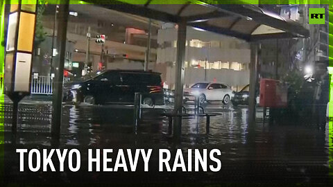 Tokyo streets flooded as torrential rain hits city