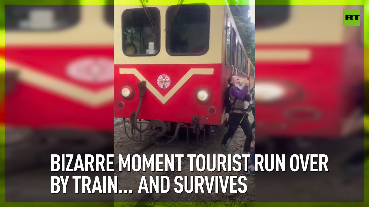 Bizarre moment tourist run over by train…