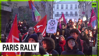 Torch-lit protest held in Paris against Macron’s pension reform