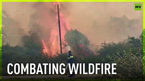 Fierce battle of Greek firefighters and raging flames