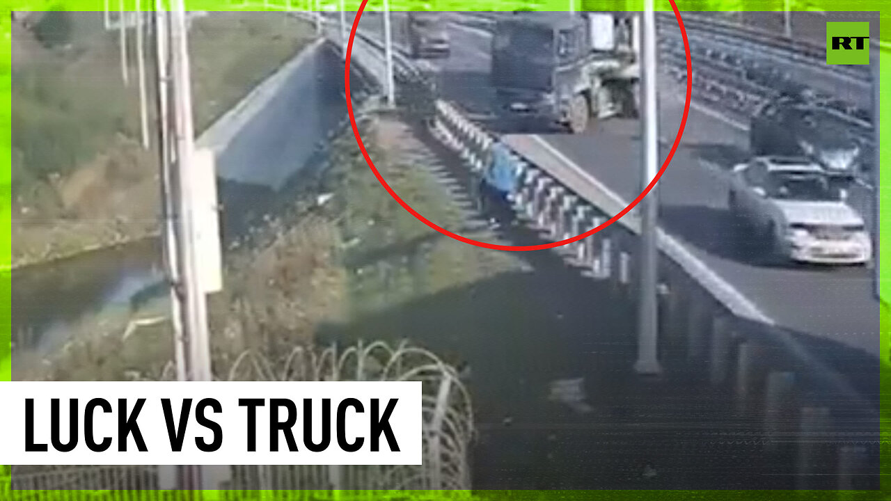 Man jumps from path of runaway truck at last second