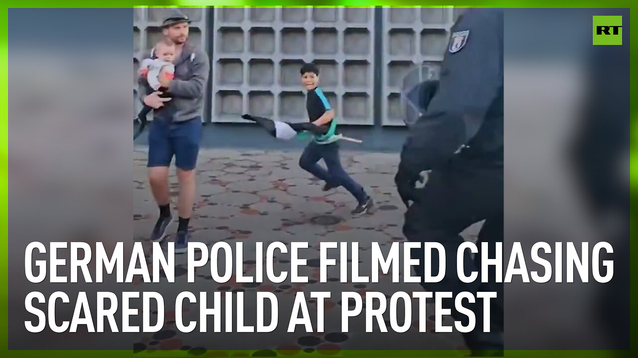 German police filmed chasing scared child at protest