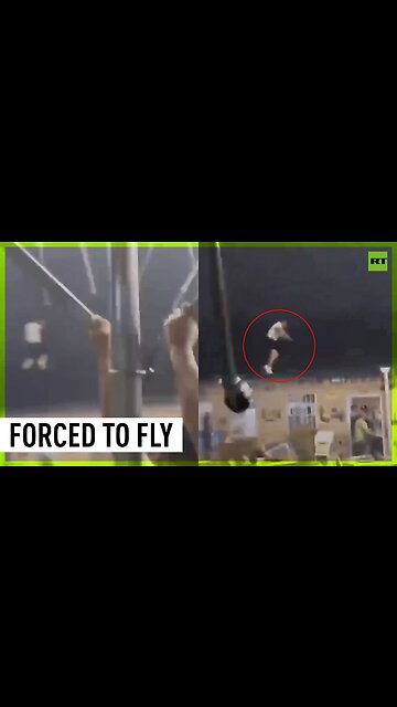 Violent winds force people into the air with canopy in hand