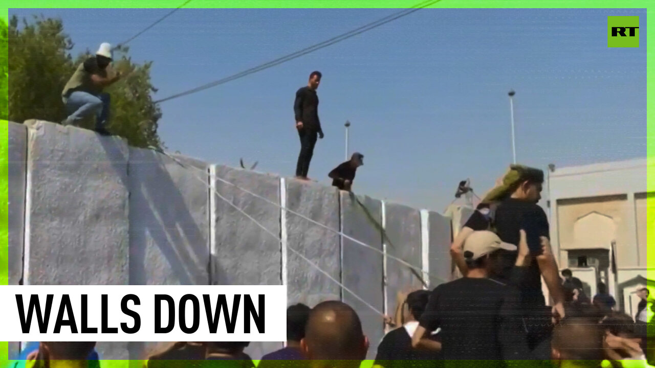 Al-Sadr supporters tear down concrete barriers while storming Iraq’s presidential palace