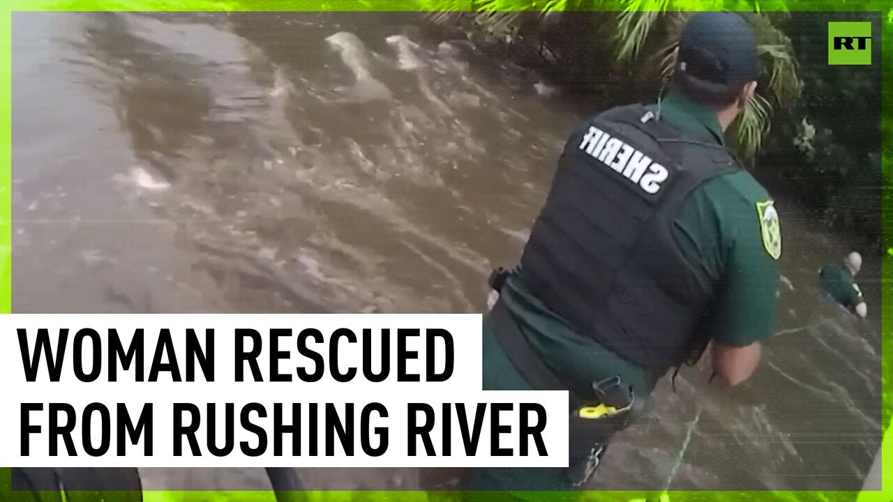 Florida deputies rescue woman whose car was swept away by rushing river