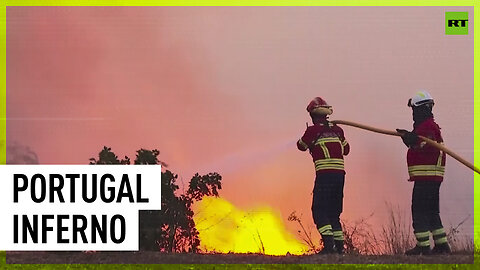 Wildfire creeps close to residential area near Lisbon