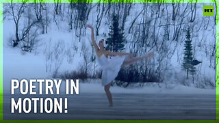 Russian ballerina performs on frozen reservoir