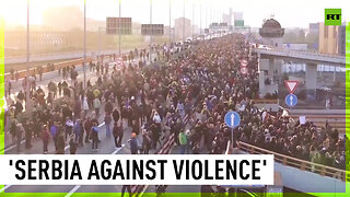 Thousands of Serbs march against mass shootings that rocked the country