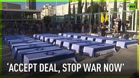 Demonstrators carry mock coffins through Tel Aviv to demand hostage release deal