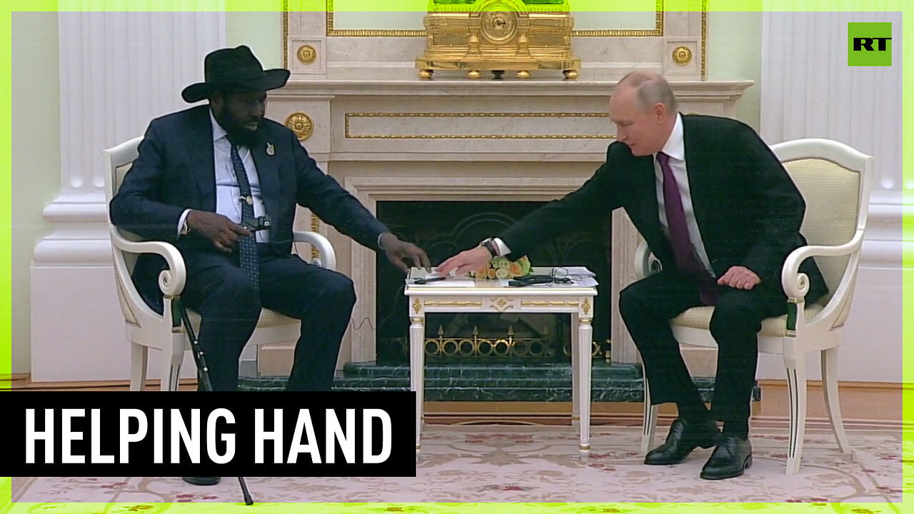 Putin helps South Sudan president with headset