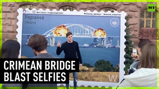 Kiev locals 'commemorate' Crimean Bridge blast with photozone