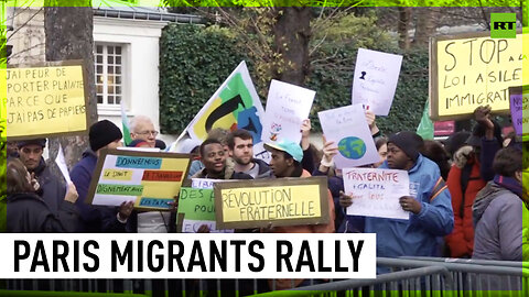 Migrants, refugees rally in Paris against controversial immigration bill