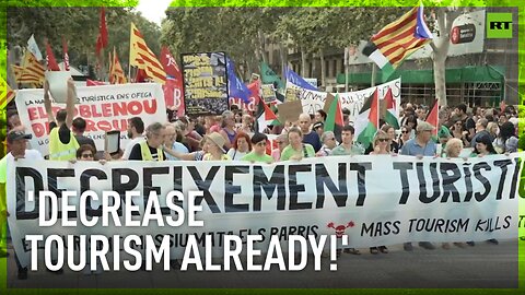 Rowdy anti-tourism protesters march through Barcelona