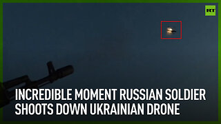 Incredible moment Russian soldier shoots down Ukrainian drone