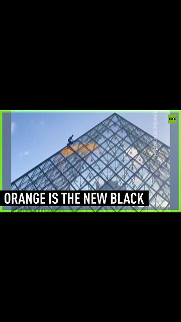 They're at it again | Environmental activists paint Louvre pyramid orange