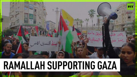 Crowds march through Ramallah to support Gaza