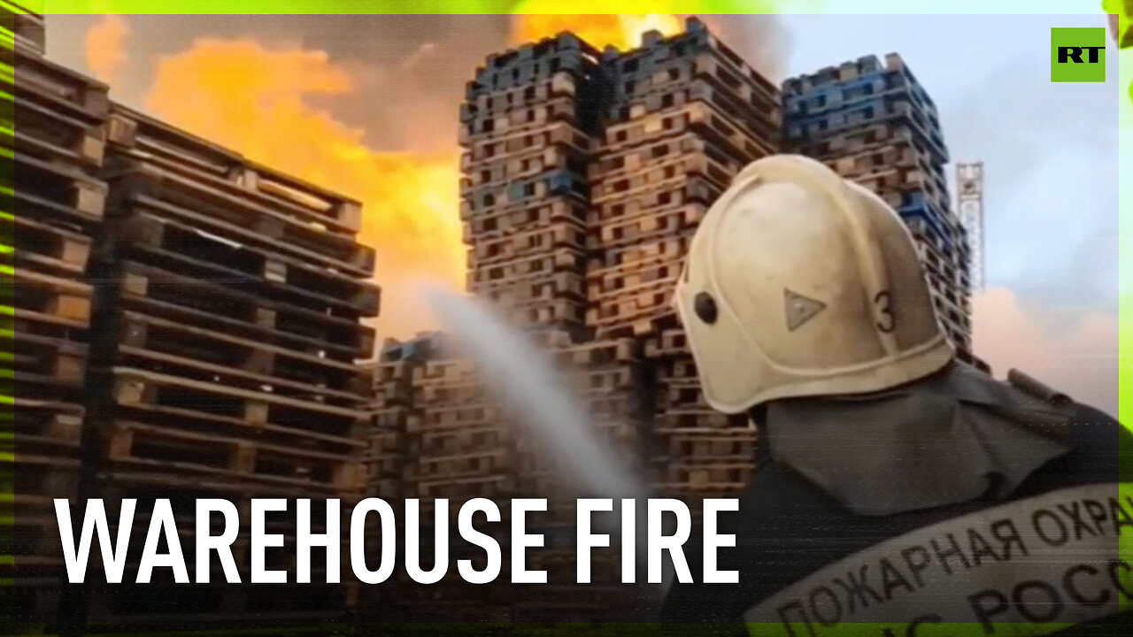 Firefighters in Russia battle flames at warehouse