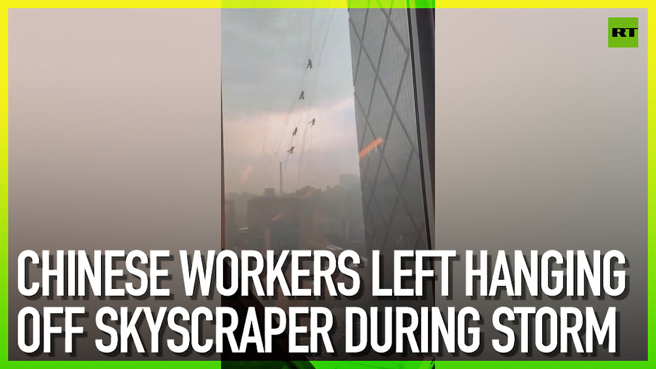 Chinese workers left hanging off skyscraper during storm