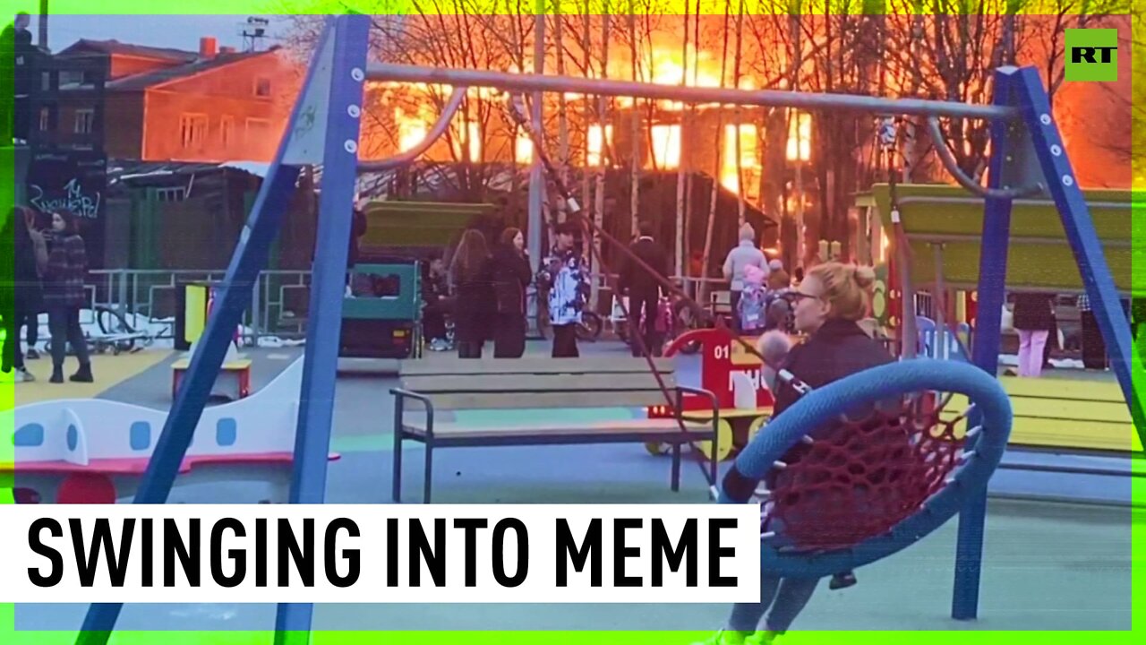 ‘0’ swings given: Woman and child on playground near burning building