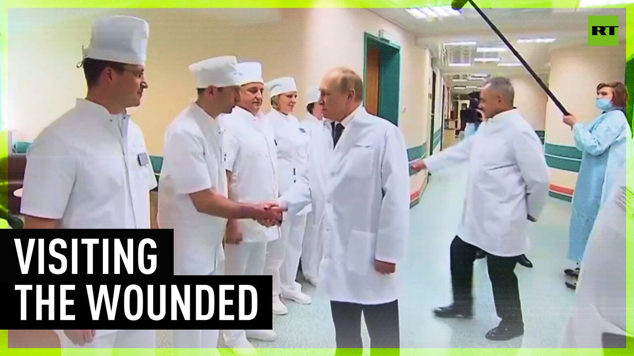 Putin and Shoigu visit wounded troops in military hospital