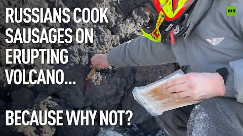 Why not? | Fearless Russian hikers cook sausages on cooling lava of erupting volcano