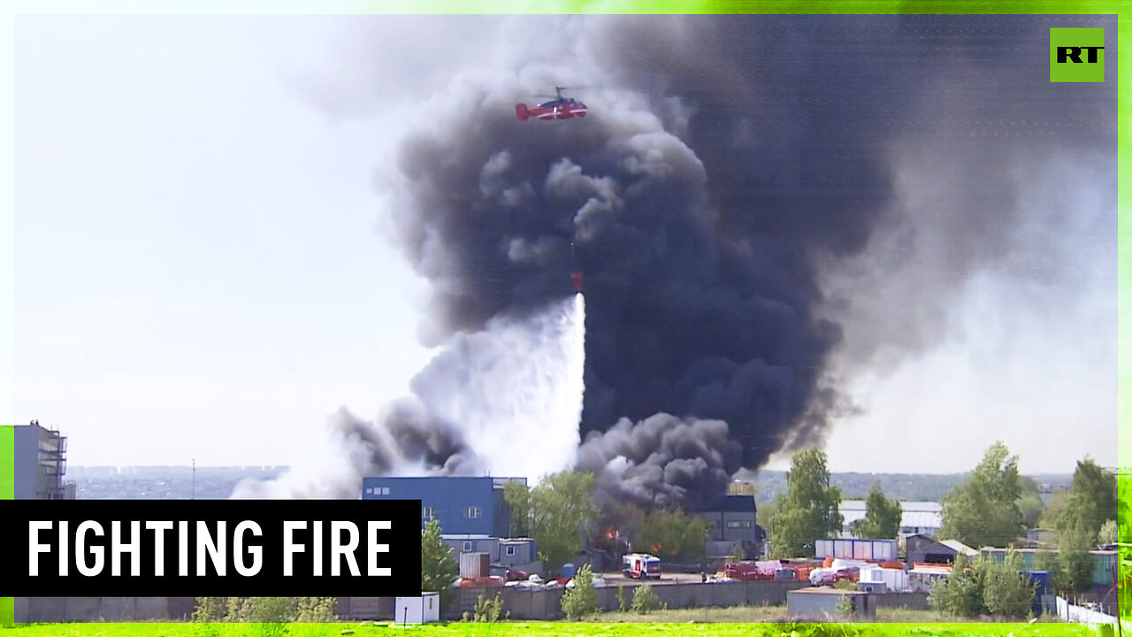 Helicopters battle warehouse fire in Moscow outskirts