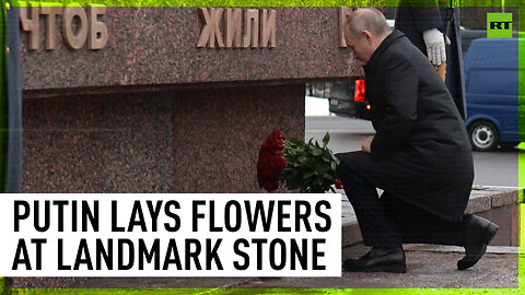 Putin lays flowers at Landmark Stone in Leningrad Region