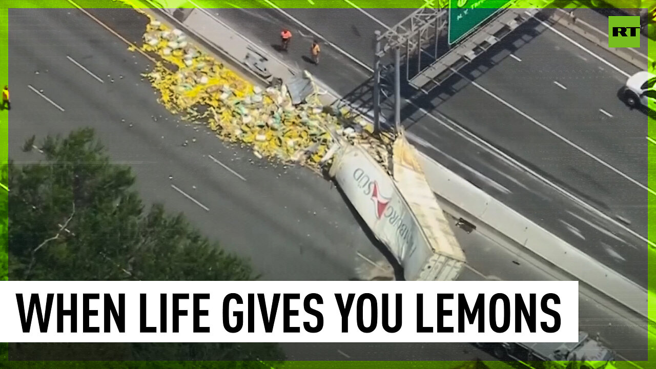 Tractor trailer overturns, spills hundreds of lemons on highway