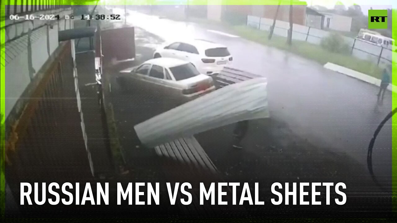 Kurgan winds | Men (unsuccessfully) attempting to hold metal sheets in place