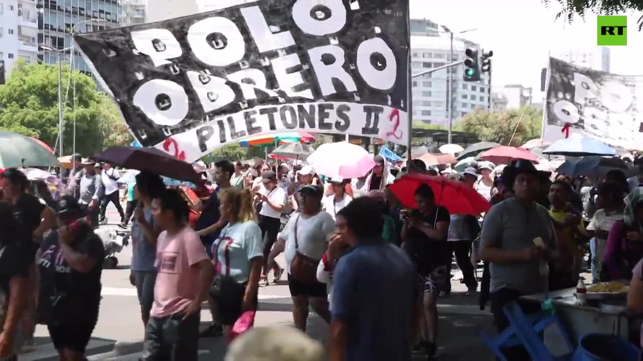 Crowds rally through Buenos Aires demanding their payments before Javier Milei takes office