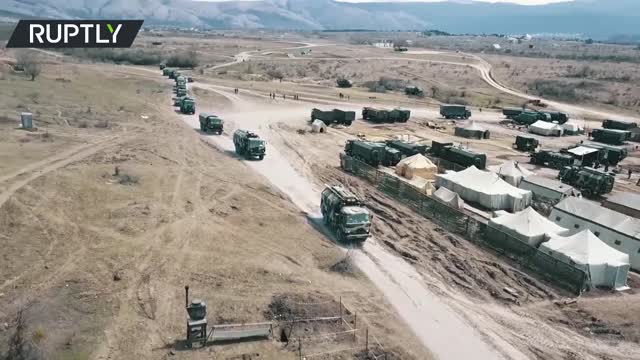 Russian troops return to their regular deployment points following drills in Crimea