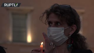 Candlelight vigil against femicide held outside Greek parliament in Athens