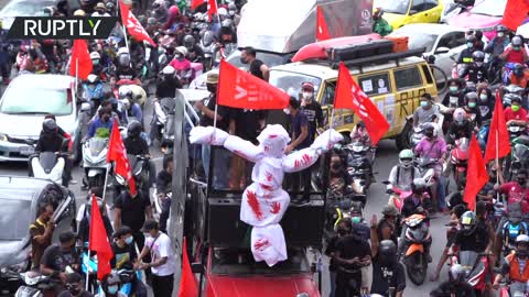 Pro-democracy Protesters Clash with Police on the Streets of Bangkok