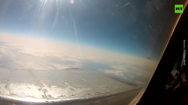 Russian MiG-31 fighter escorts American reconnaissance aircraft over the Pacific