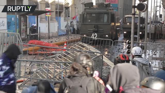 Chilean police clash with protesters demanding release of detainees over constitutional draft demos