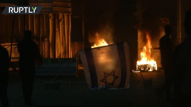 Fire on the streets of East Jerusalem following clashes between Palestinians and Israeli police