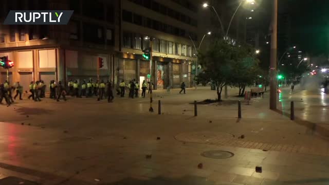 Clashes erupt at anti-govt rally in Bogota, Colombia