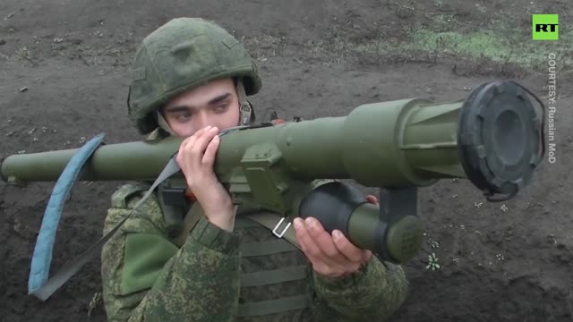 Russian snipers and rifle brigades hone their skills in military drills