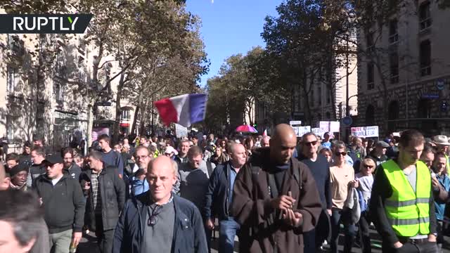 Hundreds decry health-pass mandate, increasing fuel prices at Paris rally