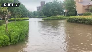 Streets turned into rivers as heavy rains swamp China’s Henan province