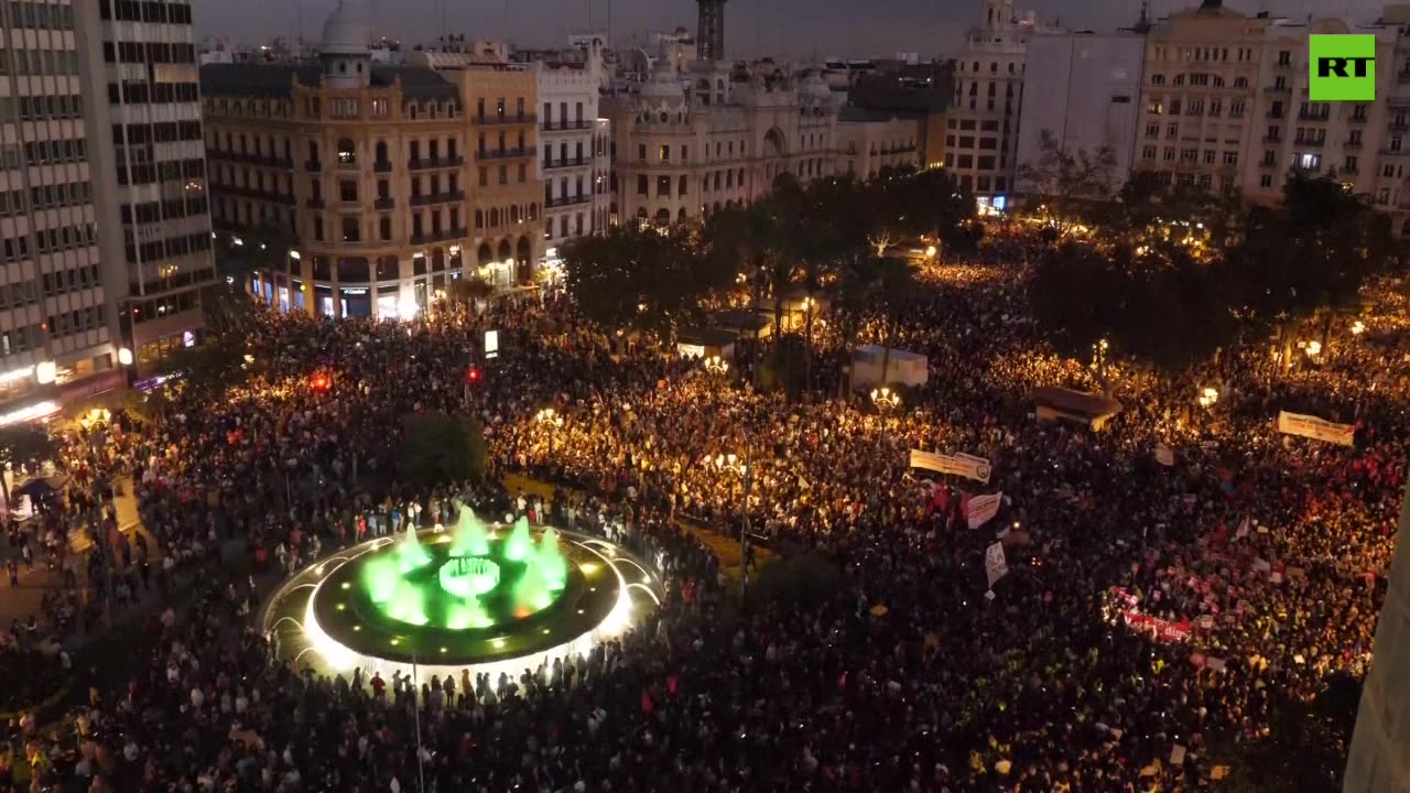 Valencia demonstrators clash with police demanding regional leader's resignation